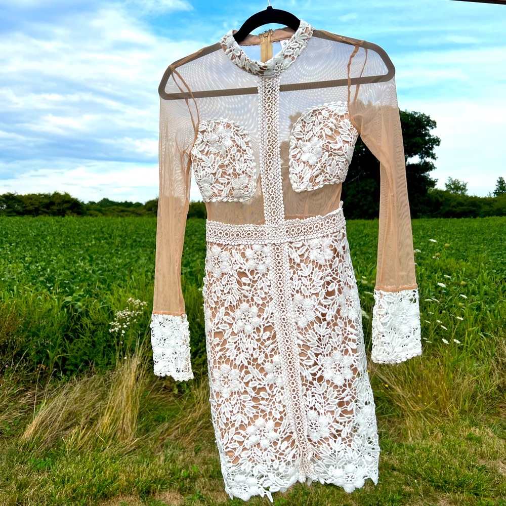 White & nude body con dress